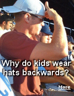 Do they want to look stupid? Some of the ''kids'' trying to look cool by wearing hats backwards, or at rakish angles, are old enough to have kids of their own.